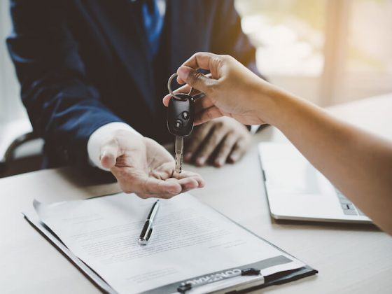 man getting car keys
