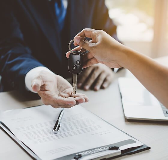 man getting car keys