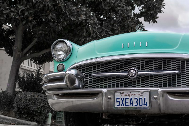 California license plate on antique car