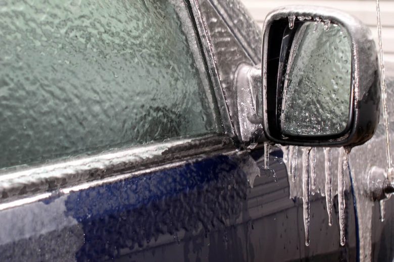 Liquid Spray for Car Window Defrost in Winter Season. Stock Photo