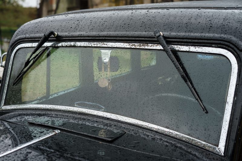 Front windshield wipers on antique car