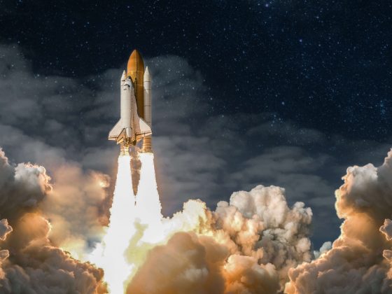 Space shuttle taking off