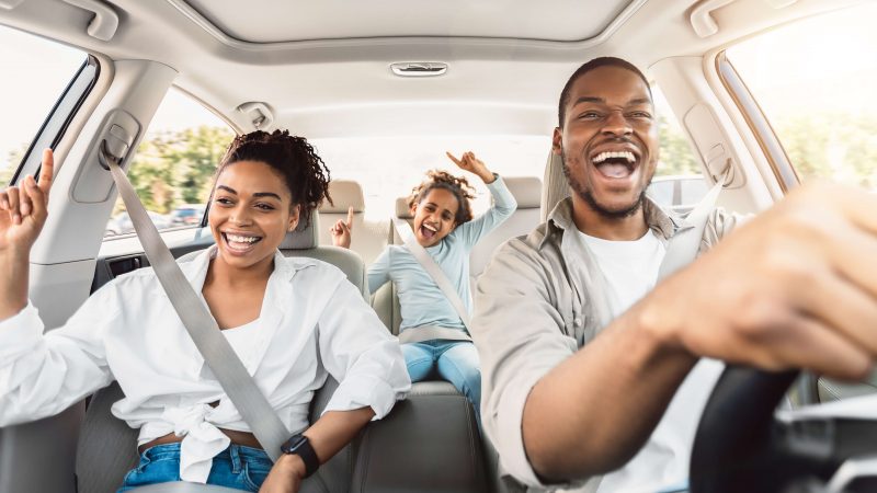Happy family in a car